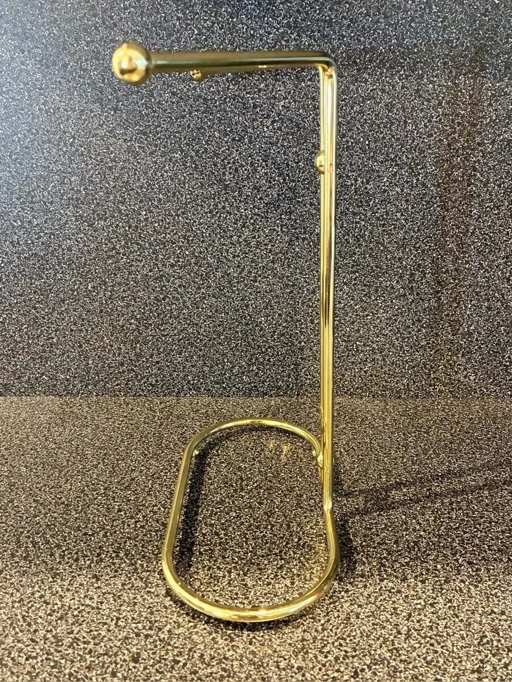 Vintage gold-tone metal countertop vanity hand towel stand